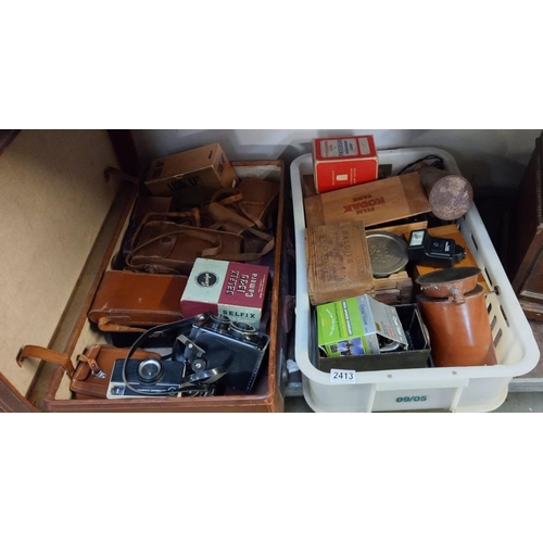 2413 - A case & box of cameras including dark room lamp etc.