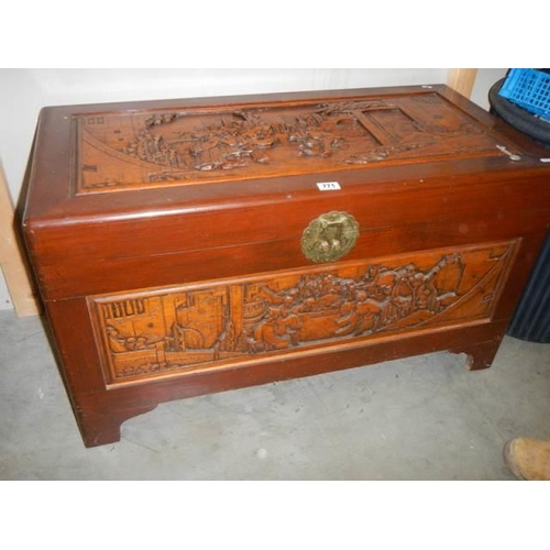 771 - A Chinese carved camphor wood chest, COLLECT ONLY.