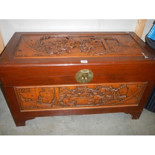 771 - A Chinese carved camphor wood chest, COLLECT ONLY.