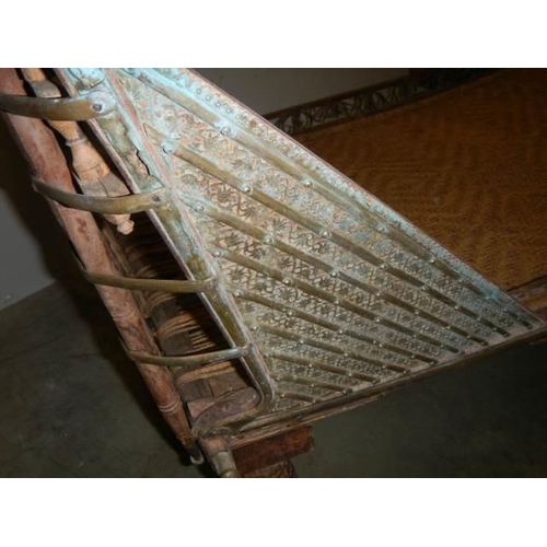 779 - A good quality Egyptian style wood and brass bed, COLLECT ONLY.