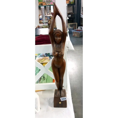 2434 - A tall wooden sculpture of a nude woman (height 59.5cm)