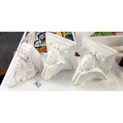 2435 - 3 small plaster wall mounts with Cherub faces