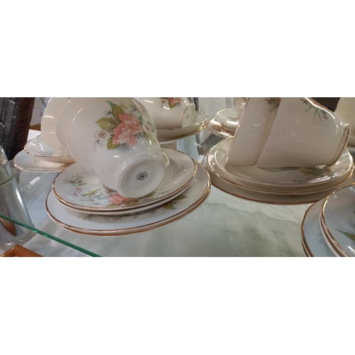 2440 - A 35 piece tea set by Fenton