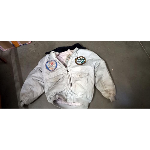 2476 - A Energy aviation limited jacket, size small with US Naval patches in need of cleaning