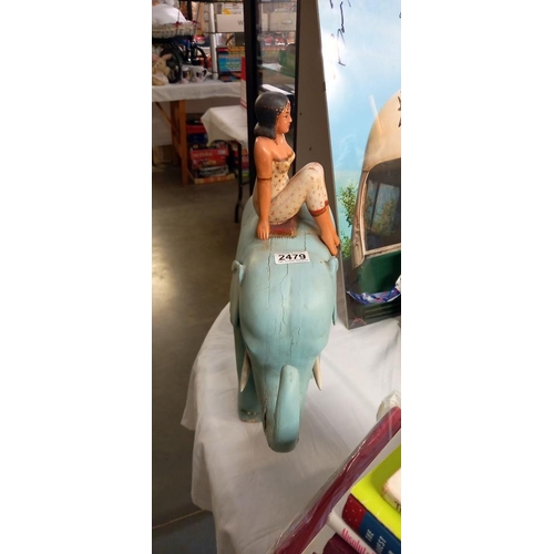 2479 - A large hard wood painted wooden elephant, length 39cm x height 41cm