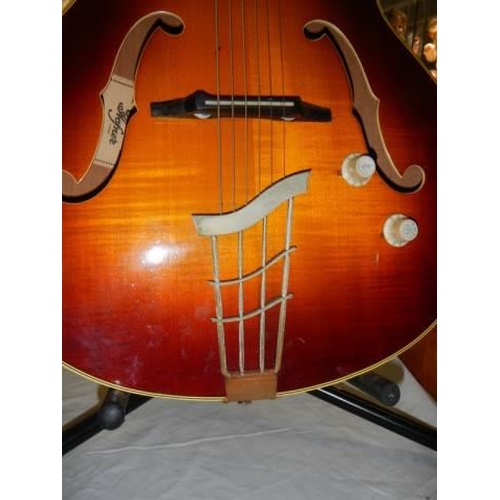 806 - A Hofner Senator Brun E1 thin 1950's electro/acoustic guitar, original pick guard with brown hard ca... 