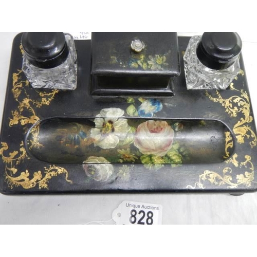 828 - A papier mache' desk tray with painted floral design.