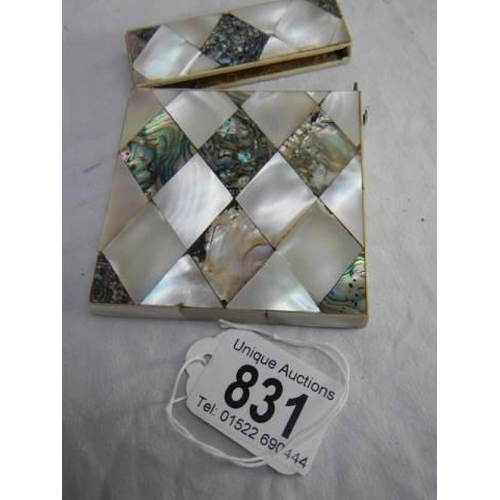 831 - A mother of pearl and abalone card case.