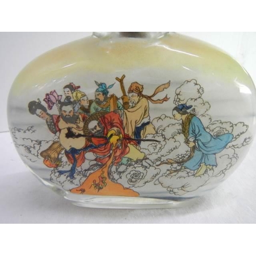 839 - Two large Chinese inside painted moonflask glass table snuff bottles: one with a bridge/harbour scen... 