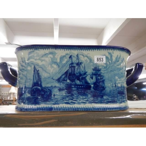 853 - A 20th century porcelain blue and white foot bath featuring ships on inside and out. COLLECT ONLY.