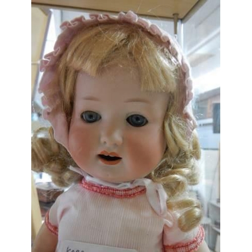 861 - A Koppelsdorf porcelain headed doll.