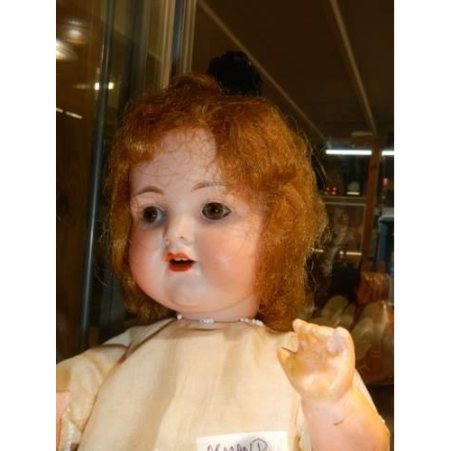 872 - An Armand Marseille bisque headed doll, model No. 990, A.2.M. 36 cm / 14.5 