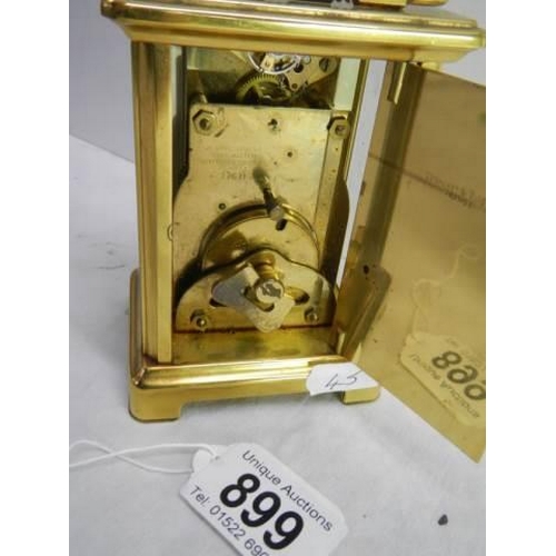 899 - A good brass carriage clock.