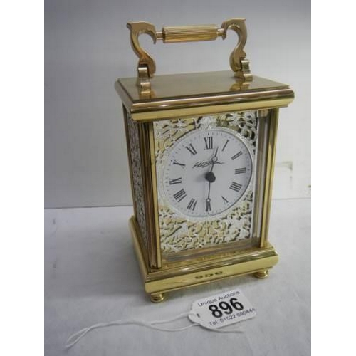 896 - A good quality brass carriage clock.