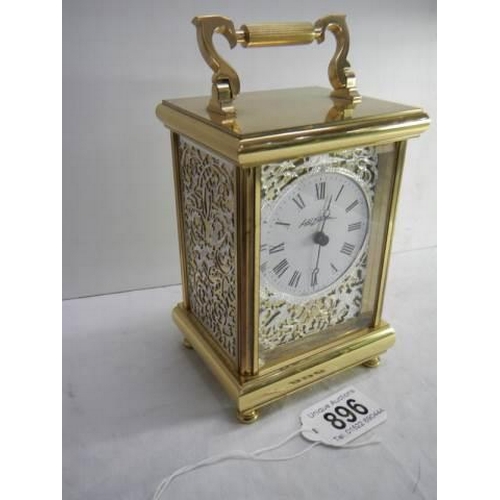 896 - A good quality brass carriage clock.