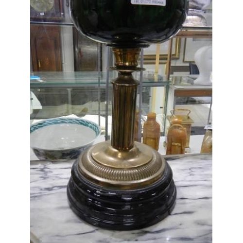 908 - A Victorian brass oil lamp with green glass font and green glass shade, COLLECT ONLY.