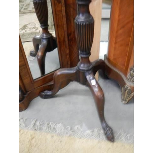 910 - A tall Victorian mahogany plant stand on tripod base. COLLECT ONLY.