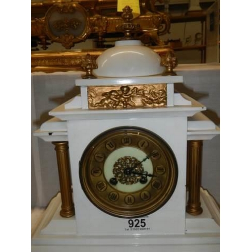 925 - An Edwardian slate mantel clock, in working order.