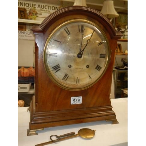 939 - A late Victorian mahogany bracket clock, in working order.