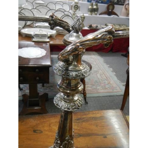 946 - A pair of early Victorian Sheffield plate candelabra.