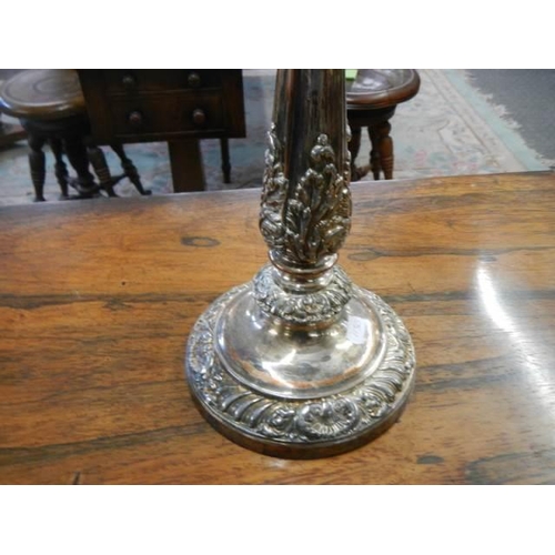 946 - A pair of early Victorian Sheffield plate candelabra.