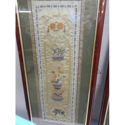 958 - A pair of framed and glazed Chinese embroidered silks, COLLECT ONLY.