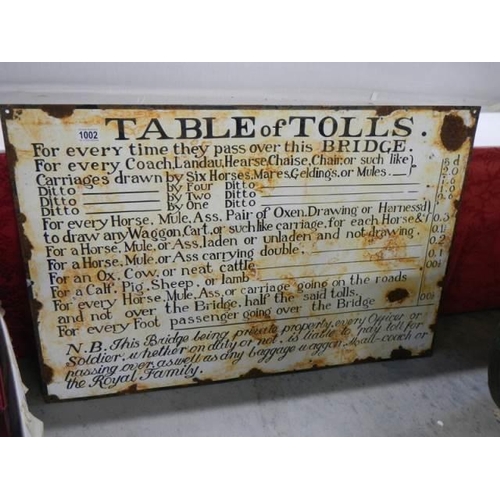 1002 - An enamel Table of Tolls sign, (90cm x 60cm) COLLECT ONLY.