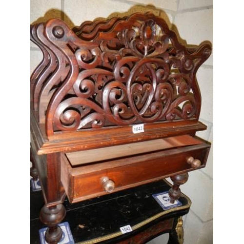 1042 - A 20th century mahogany Canterbury with single drawer, COLLECT ONLY.