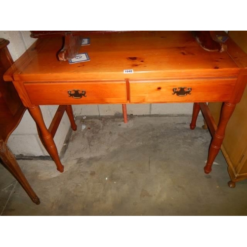 1048 - A two drawer pine side table, in good condition, COLLECT ONLY.