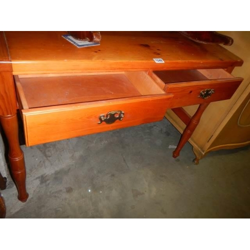 1048 - A two drawer pine side table, in good condition, COLLECT ONLY.