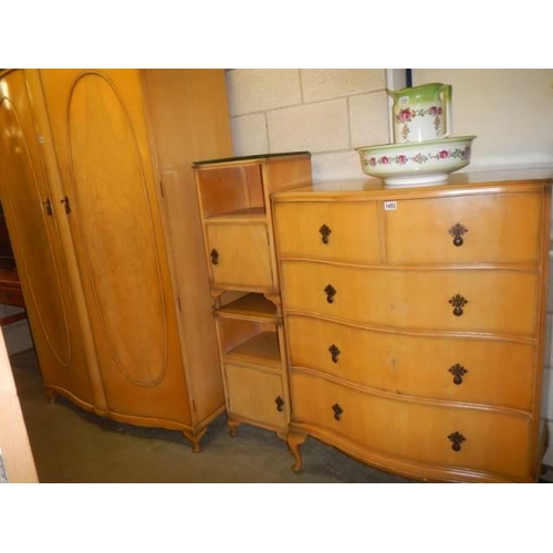 1049 - A four piece mid 20th century bedroom suite comprising wardrobe, 2 over 3 chest of drawers and 2 bed... 