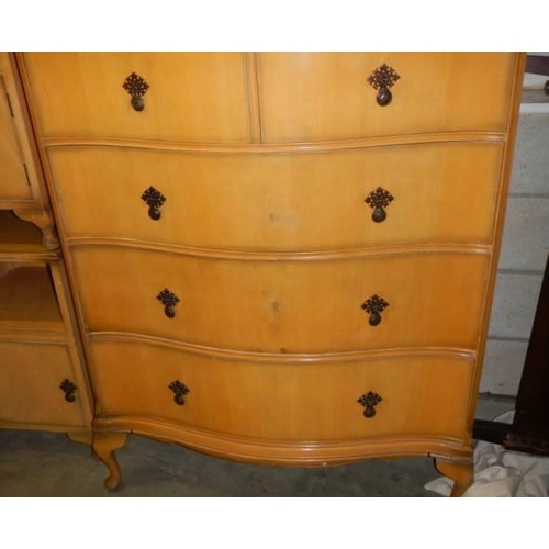 1049 - A four piece mid 20th century bedroom suite comprising wardrobe, 2 over 3 chest of drawers and 2 bed... 