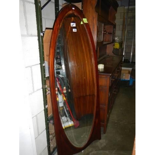 1051 - A Victorian mahogany framed oval mirror, COLLECT ONLY.