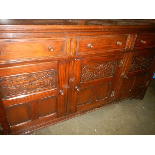 1052 - A good quality oak three door dresser, COLLECT ONLY.