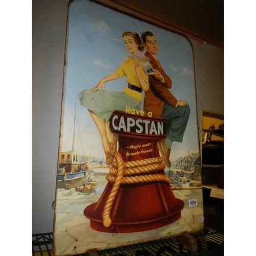 1058 - An early 20th century Capstan sign on two brackets. COLLECT ONLY.