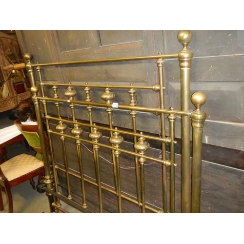 1079 - A good quality brass bedstead with side rails. COLLECT ONLY.