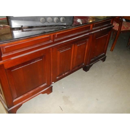 1102 - A good solid mahogany glass topped office desk, COLLECT ONLY.