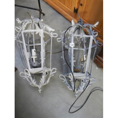 1108 - A pair of wrought iron hanging lanterns, COLLECT ONLY