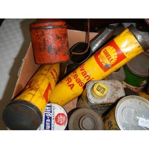 1109 - A box of old advertising oil cans. COLLECT ONLY.