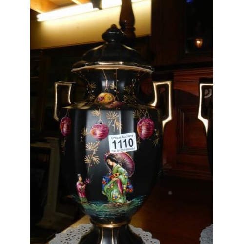 1110 - A pair of early 20th century hand painted vases.