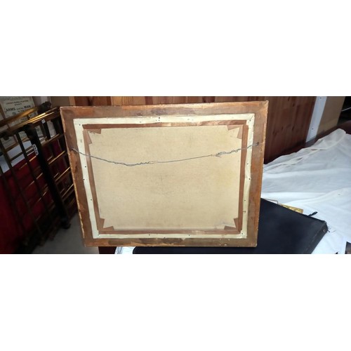 611 - A gilt framed painting of a horse and dog in a stable.