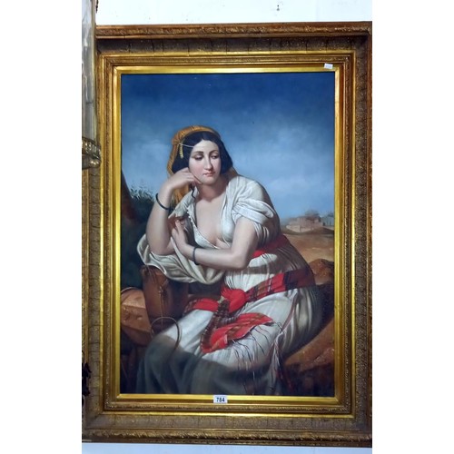 784 - A gilt framed oil on canvas painting of a lady, COLLECT ONLY.