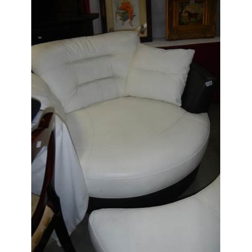 1126 - A large contemporary two seater revolving chair with matching foot stool, COLLECT ONLY.