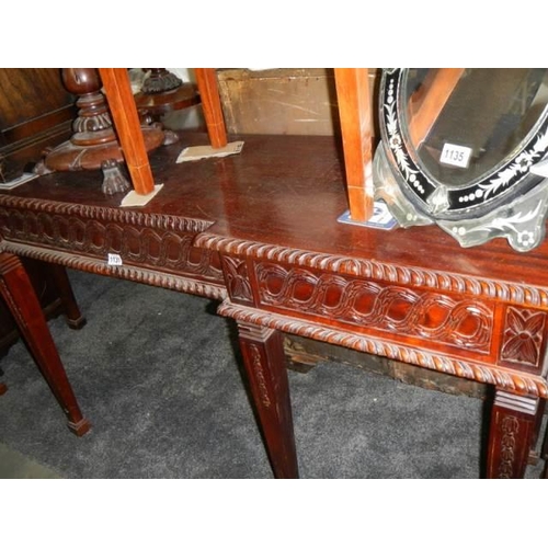 1131 - A long mahogany hall table, COLLECT ONLY.