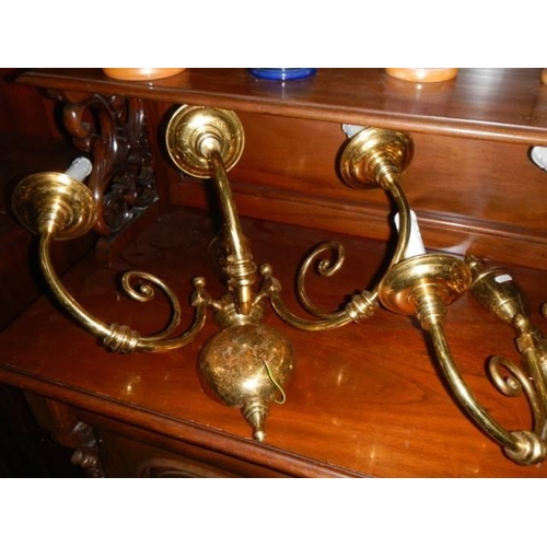 1144 - Four good quality matching double brass wall lights.