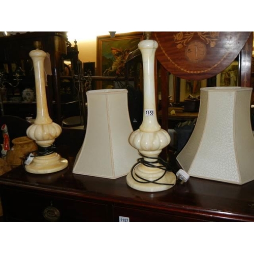 1158 - A pair of marble table lamps with shades, fixings a/f, COLLECT ONLY.