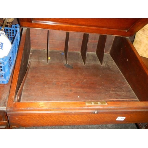 1159 - An early 20th century mahogany desk with sloping top and two drawers, COLLECT ONLY.