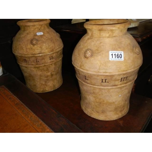 1160 - A pair of unusual ceramic vases featuring Roman numerals. COLLECT ONLY. (1 A/F)