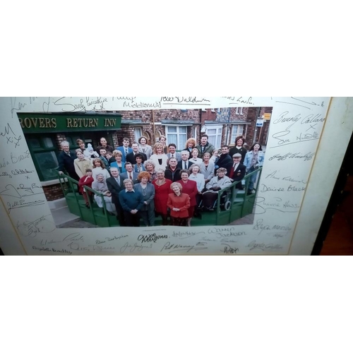 2482 - A 1990's framed and glazed signed picture of the cast from Coronation Street