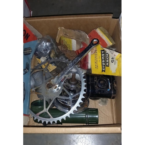 2487 - A box and tin of various cycle parts etc